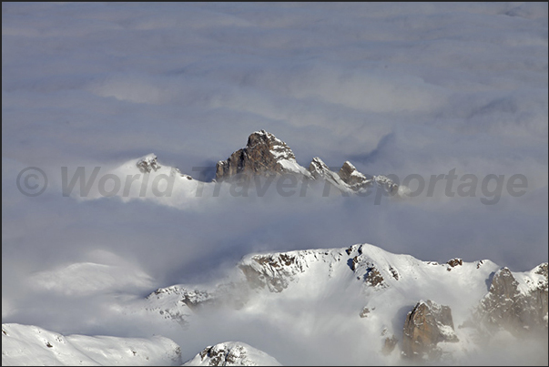 The Alps peak emerge out from the sea of clouds