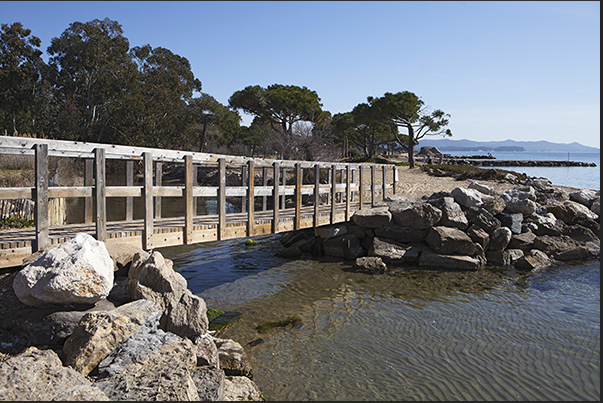 Coastal Trail. Footbridge before reaching the beaches of La Londe Coastal Trail. Footbridge before reaching the beaches of La Londe