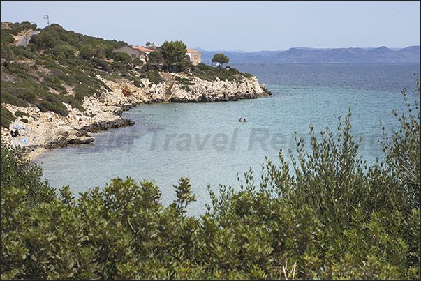 The east coast of Saint Antioco Island near the village of Portixeddu. On the horizon the eastern coasts of Sardinia