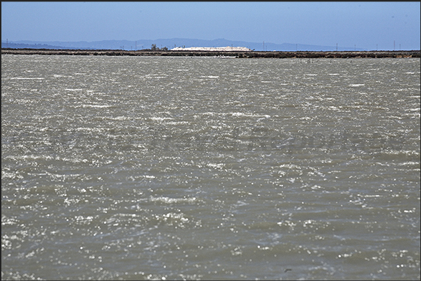 Salt pans in the Gulf of Palmas in front of Saint Antioco island