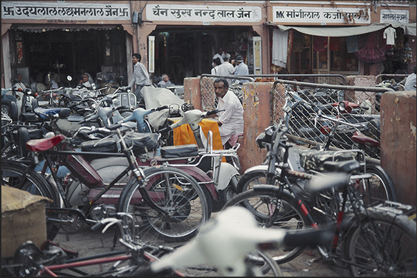 City of Jaipur. A tailor submerged by bicycles City of Jaipur. A tailor submerged by bicycles