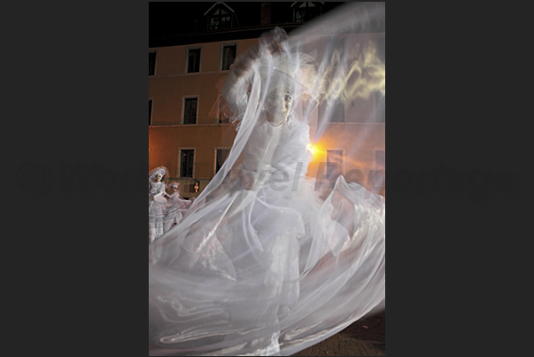 Dancers on stilts along the streets of the historic center Dancers on stilts along the streets of the historic center
