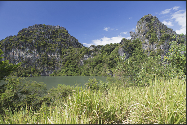 East Coast. Village of Hienghène. The cliffs and the lagoon of Lindéralique East Coast. Village of Hienghène. The cliffs and the lagoon of Lindéralique