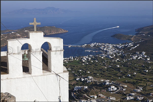 Bay with the port of Livadi and on the horizon the island of Sifnos Bay with the port of Livadi and on the horizon the island of Sifnos