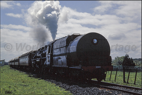 Passage of the train in the countryside around Glenbrook pulled by a 1949 steam locomotive Passage of the train in the countryside around Glenbrook pulled by a 1949 steam locomotive