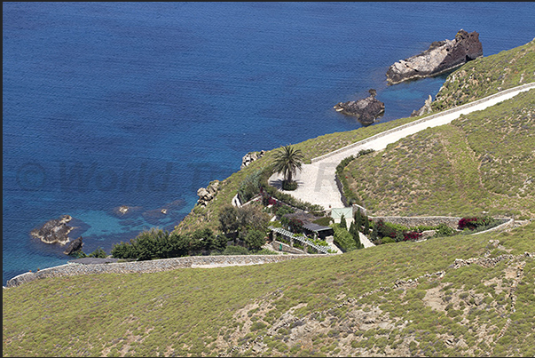Panormos Bay, hidden villas on the east side of the bay Panormos Bay, hidden villas on the east side of the bay