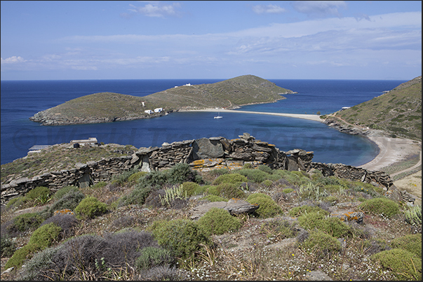Apokrousi Bay with the sandy strip that connects the coast to the island of Kolona Apokrousi Bay with the sandy strip that connects the coast to the island of Kolona