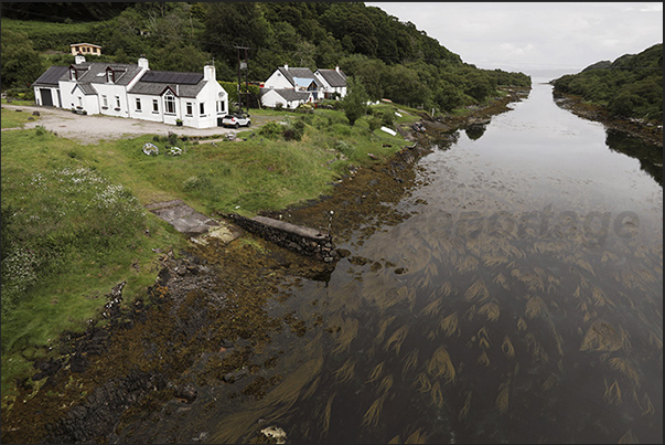 The channel that separates the Scottish coast with the island of Clachan The channel that separates the Scottish coast with the island of Clachan