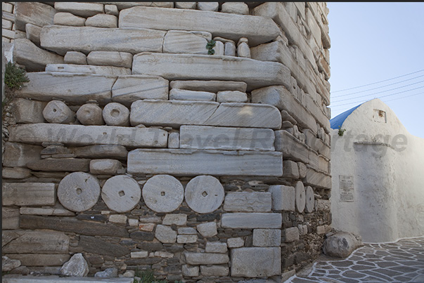 The ancient walls of Parikia Castle made with parts of Greek and Roman temples