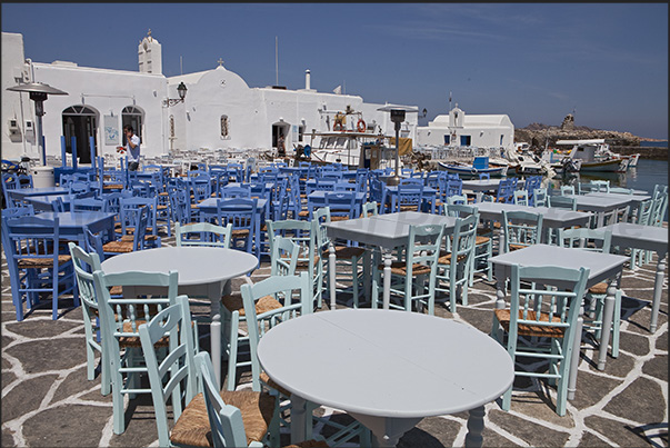 Naoussa. The waterfront of the old fishing port with restaurants on the docks