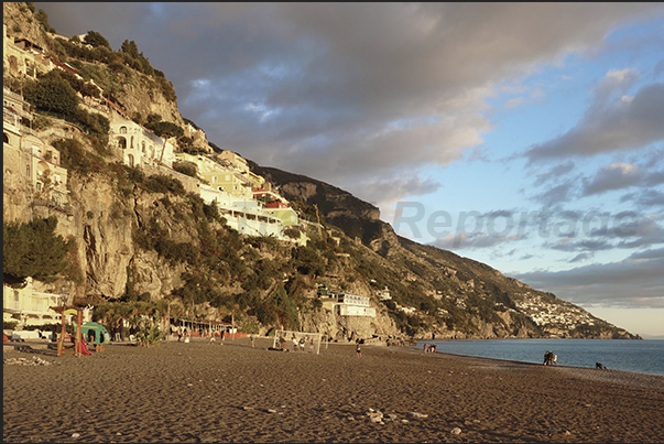 The beach in the town of Positano at sunset