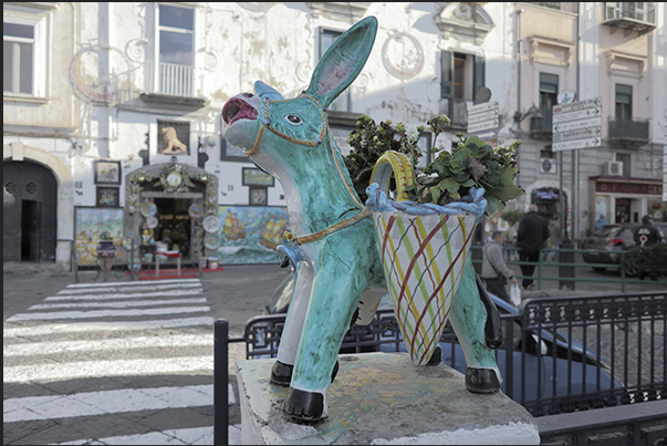 In the town of Vietri a ceramic donkey carrying baskets for grapes and olives evokes the area's rural spirit