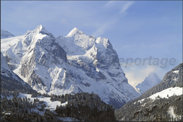 Mount Wetterhorn and, in the background, the summit of Mount Eiger Mount Wetterhorn and, in the background, the summit of Mount Eiger